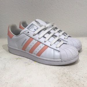 Adidas white shell toes with pink stripes